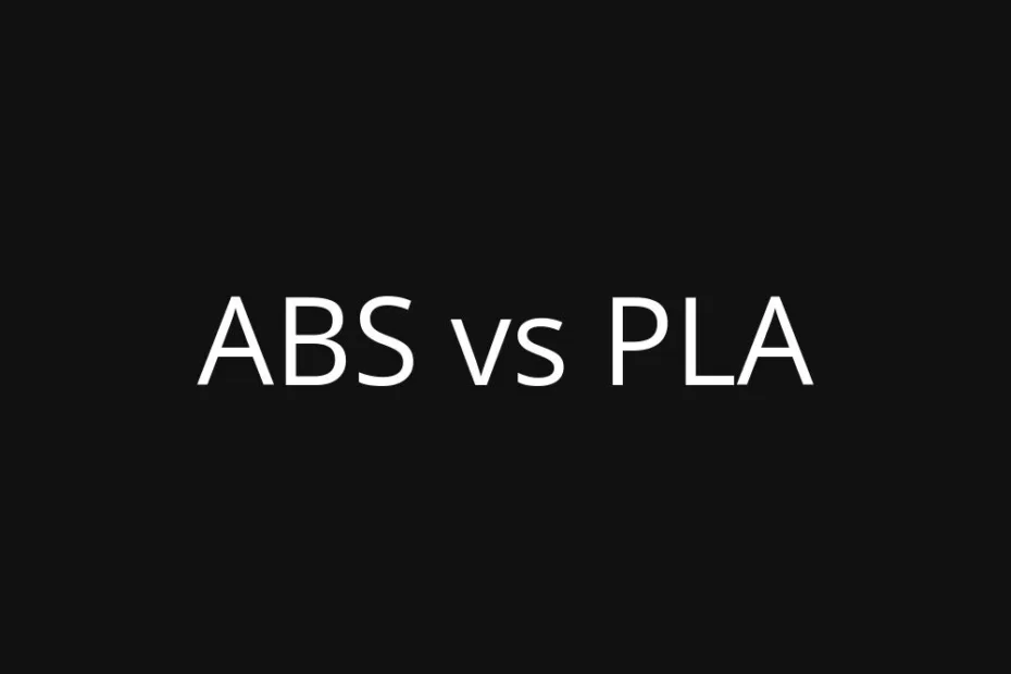 A close-up of a 3D printer filament spool labeled 'ABS vs PLA' on a black background.
