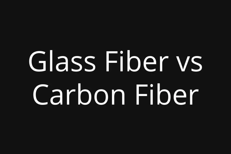 A close-up of a glass fiber strand next to a carbon fiber strand, illustrating their textures.